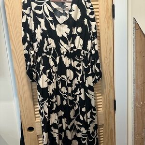 Elegant Black and Cream Floral Dress